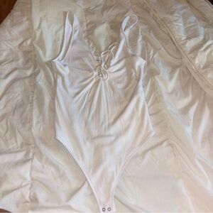 Abercrombie & Fitch white ribbed lace-up bodysuit, size M.